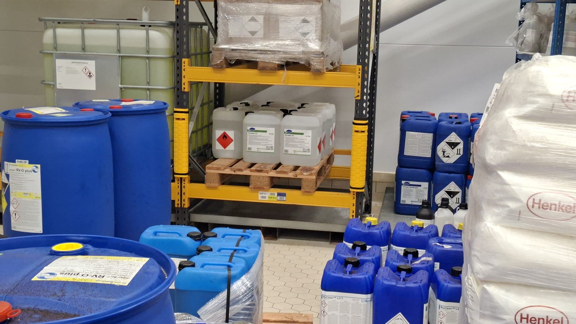Chemical warehouse interior with storage shelving relevant to combustible dust risk environments