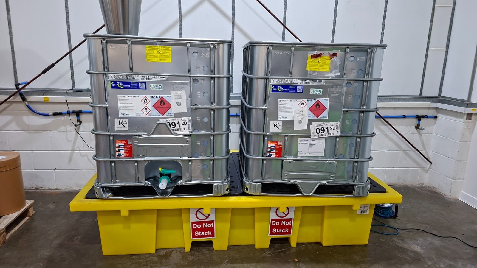 IBC containers of flammable liquid on a spill containment bund