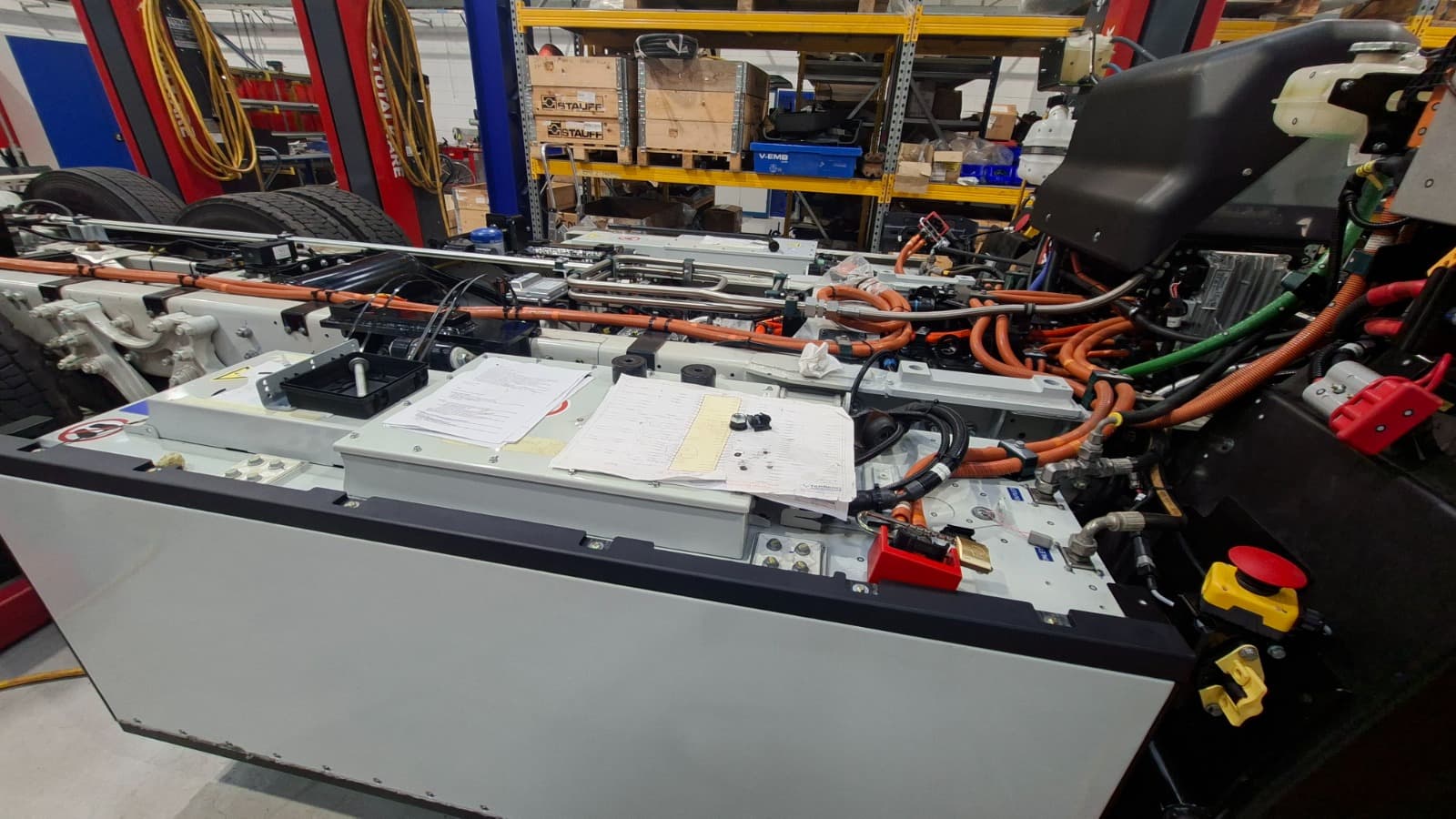 Electric vehicle battery pack and high-voltage cabling undergoing assessment