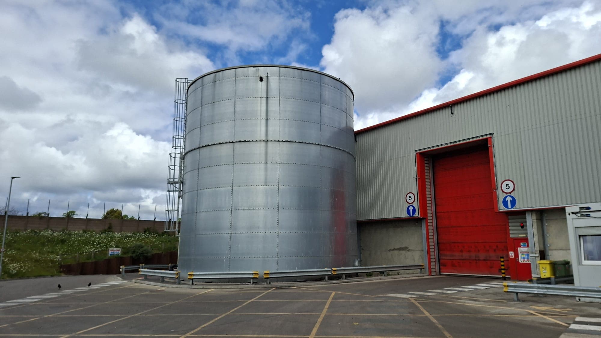 Industrial metals site with storage tank and process equipment